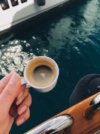 High angle view of coffee cup on table