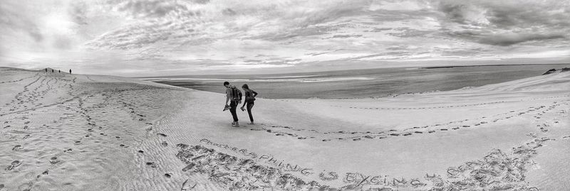 Couple walking on beach