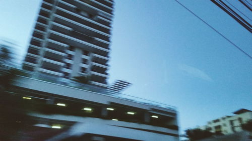 Low angle view of modern building against sky