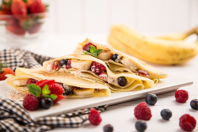 Close-up of fruits in plate