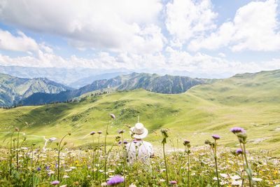 Scenic mountains against cloudy sky