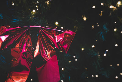 Close-up of christmas tree at night