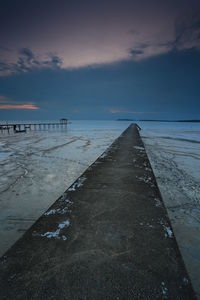 Scenic view of sea against sky at sunset