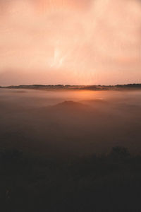 Scenic view of sea against sky at sunset