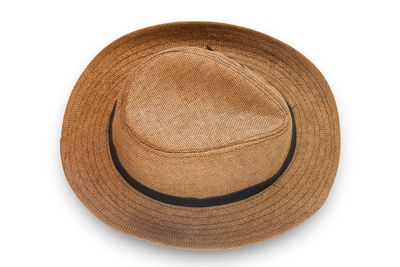 Close-up of hat against white background