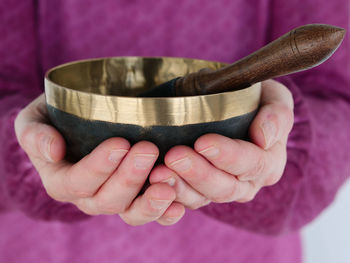 Close-up of hand holding ice cream