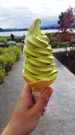 Close-up of person holding ice cream cone