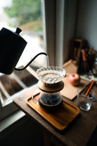 Close-up of coffee cup on table