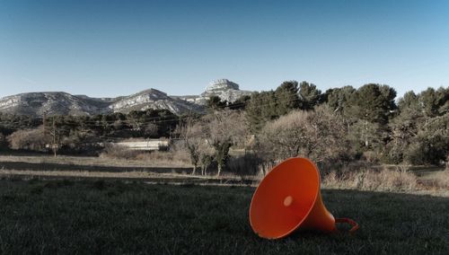 Scenic view of field against clear sky