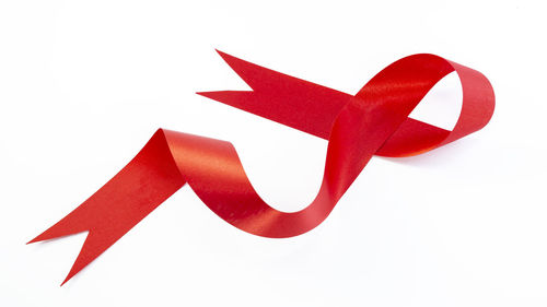 Close-up of paper flag against white background