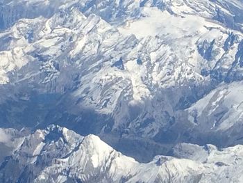 Scenic view of snow covered mountains