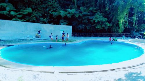 People playing in swimming pool