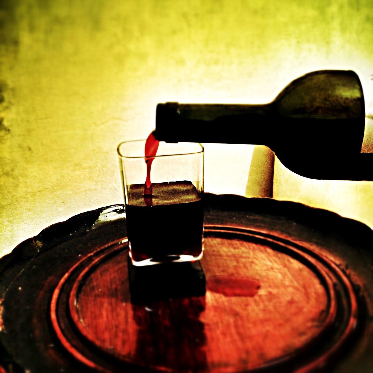 close-up, table, focus on foreground, indoors, drink, glass - material, reflection, still life, sunset, red, selective focus, no people, single object, part of, built structure, food and drink, freshness, illuminated, refreshment