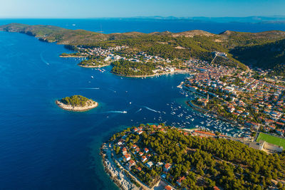 High angle view of sea and cityscape