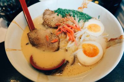 Close-up of soup served in bowl on table