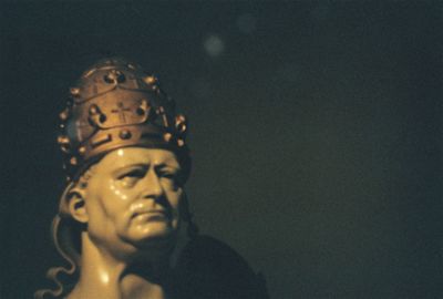 Close-up of statue against black background