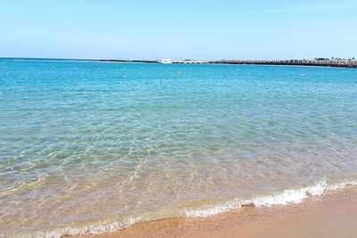 Scenic view of sea against clear sky