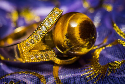 Close-up of christmas decorations on metal