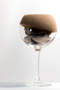 Close-up of bread over white background