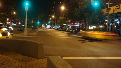 Traffic on street at night