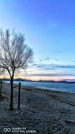 Scenic view of sea against sky at sunset