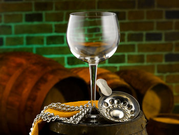Close-up of wineglass on table
