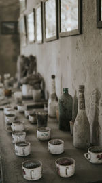 Close-up of wine bottles on table