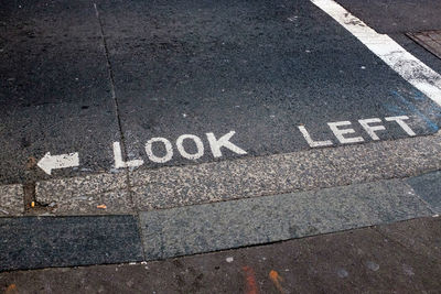 High angle view of text on road