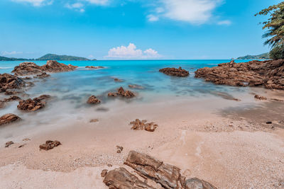 Scenic view of beach against sky