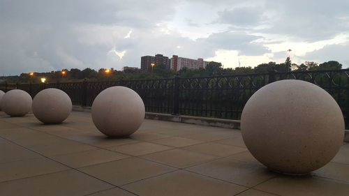 Metallic structure against sky in city