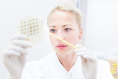 Close-up of woman working in laboratory