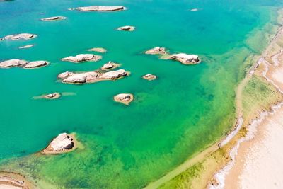 High angle view of boats on sea shore
