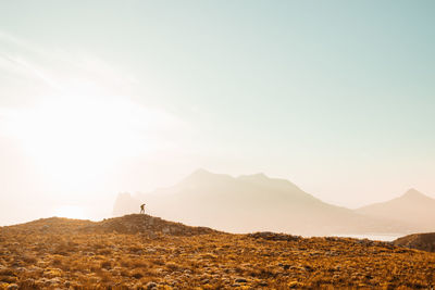 Scenic view of silhouette mountains against sky