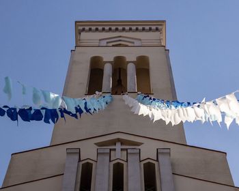 Low angle view of traditional building against clear blue sky church 