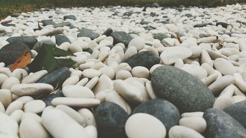 Full frame shot of pebbles at beach