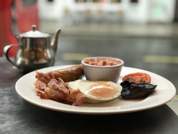 Close-up of breakfast served on table