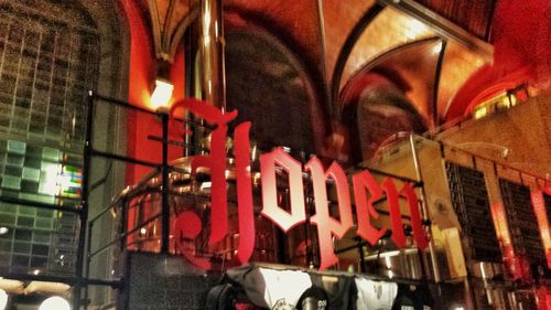 Low angle view of red wall