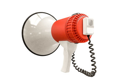 Close-up of telephone booth against white background