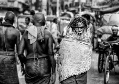 Man looking at city street