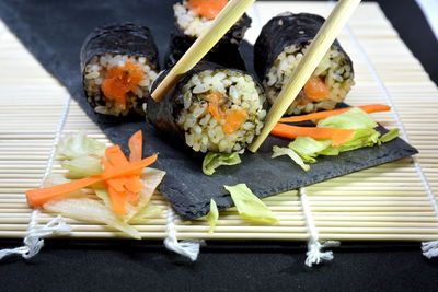 Close-up of sushi served in plate