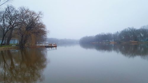 Reflection of trees in calm lake