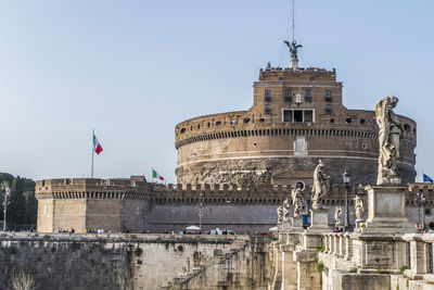 Tevere river and castle sant'angelo in rome with blue sky