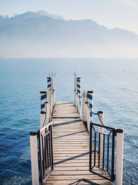 Pier over sea against sky