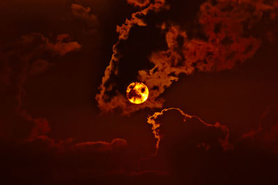 Low angle view of moon against sky at night