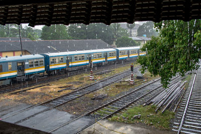 Train on railroad track against sky