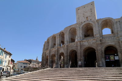 Arles amphitheatre against clear sky