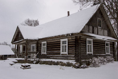 House against sky during winter