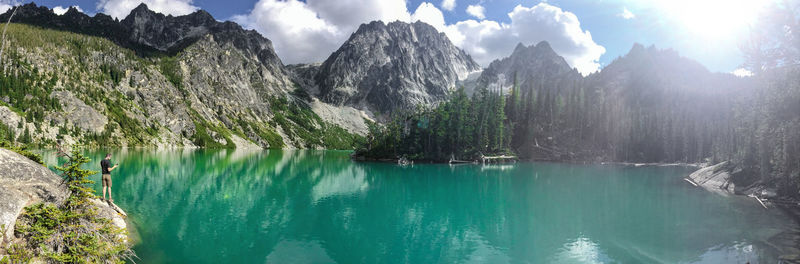 Panoramic shot of calm lake against mountain range