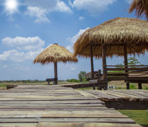 Built structure on beach against sky