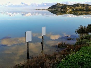 Scenic view of mountains against blue sky